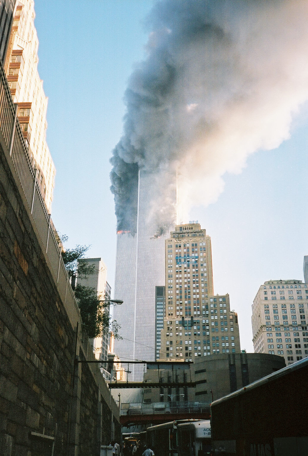 The smoke darker still, the flame more visible.